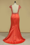 2024 Evening Dresses Mermaid Scoop Short Sleeves Satin With Beading Open Back